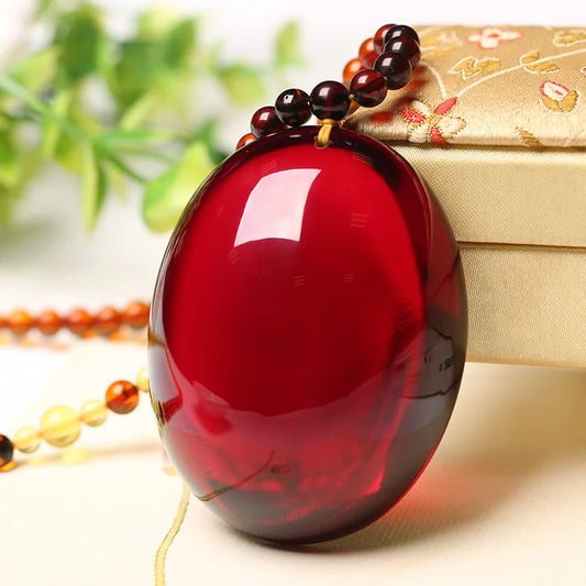 Collier pendentif en cire d'abeille ambre bordeaux naturel luxure.
