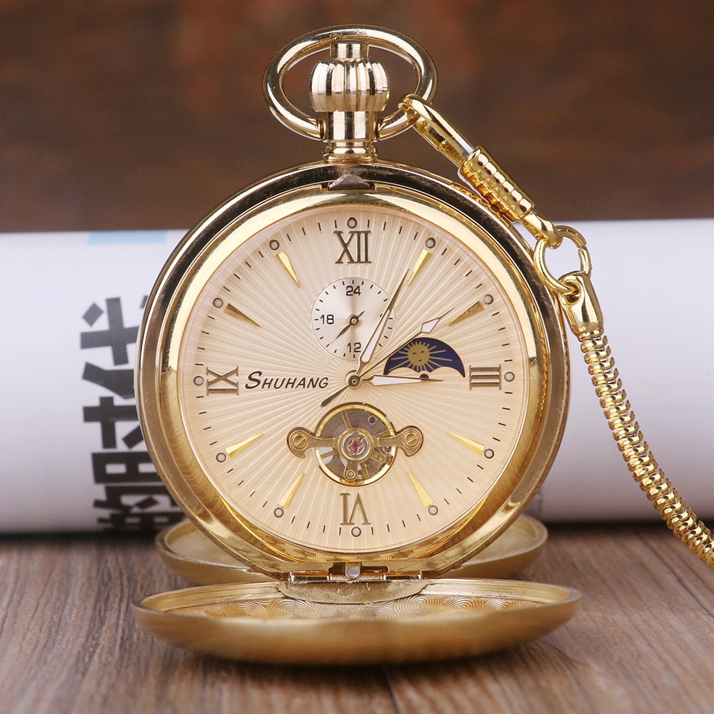 Montre de poche mécanique en acier doré.