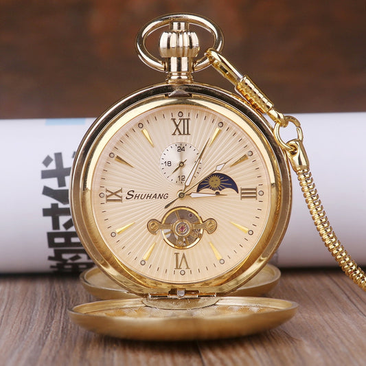 Montre de poche mécanique en acier doré.