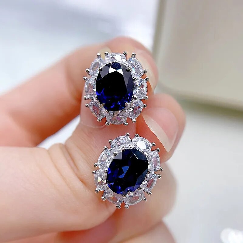 Boucles d'oreilles luxe élégantes pour femmes avec pierre saphir.