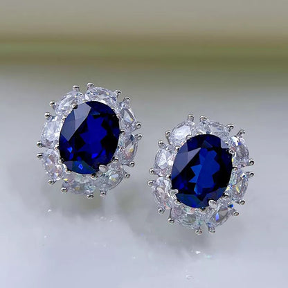 Boucles d'oreilles luxe élégantes pour femmes avec pierre saphir.