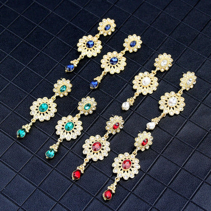 boucle d'oreille en forme de goutte d'eau pour femmes couleur or.