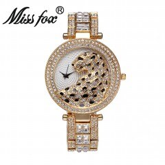 Montre tigre luxe élégante pour femmes étanche antichoc dorée.