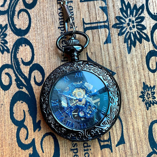 Montre de poche mécanique à chiffres romains.