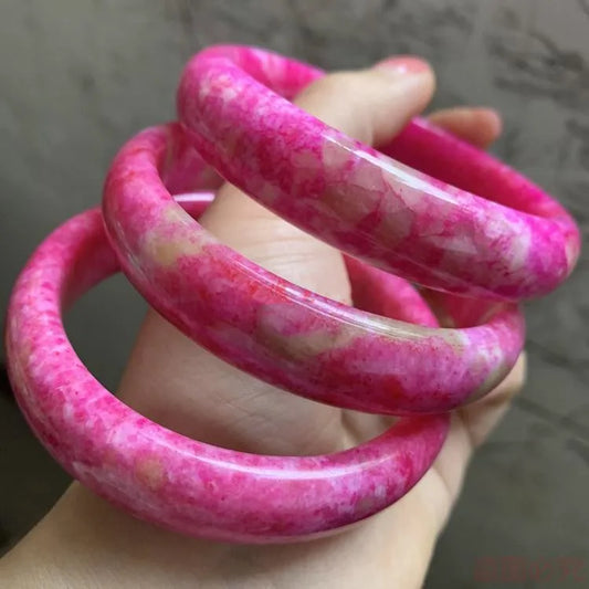 Bracelet en jade élégant en pierre coloré .