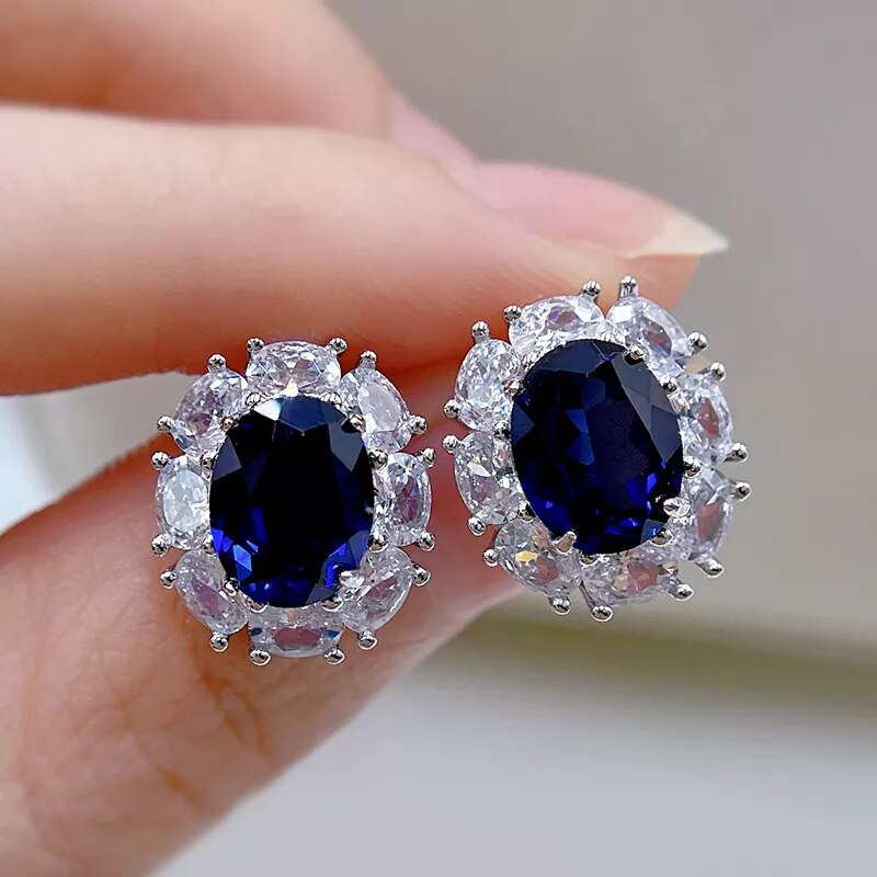 Boucles d'oreilles luxe élégantes pour femmes avec pierre saphir.