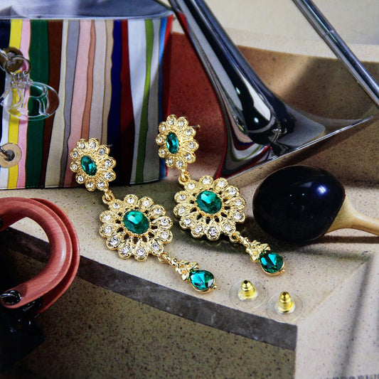 boucle d'oreille en forme de goutte d'eau pour femmes couleur or.