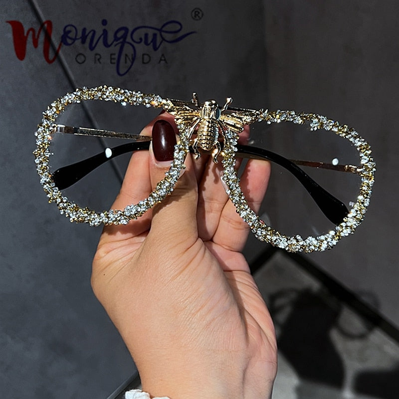 Lunettes de soleil de luxe pour femmes, monture métallique.