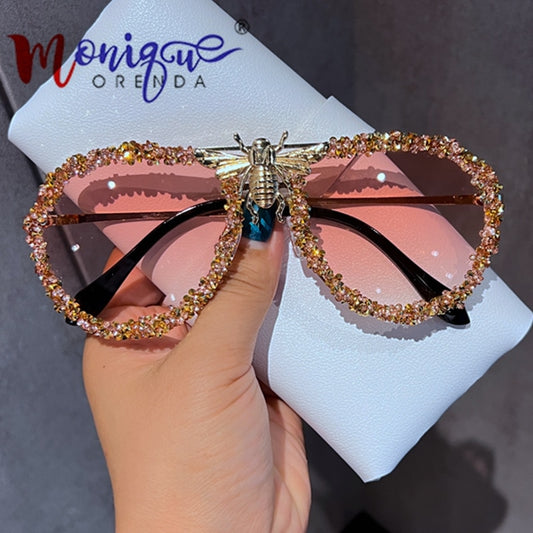 Lunettes de soleil de luxe pour femmes, monture métallique.
