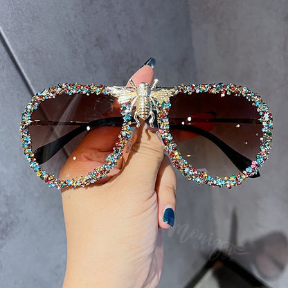 Lunettes de soleil de luxe pour femmes, monture métallique.