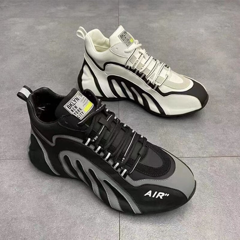 Chaussures de course plates et décontractées pour hommes.