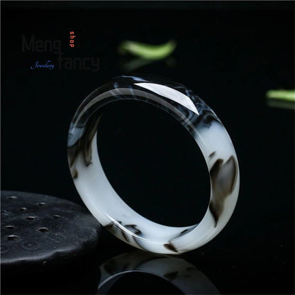 Bracelet Hetian de fleurs noires et blanches naturelles.