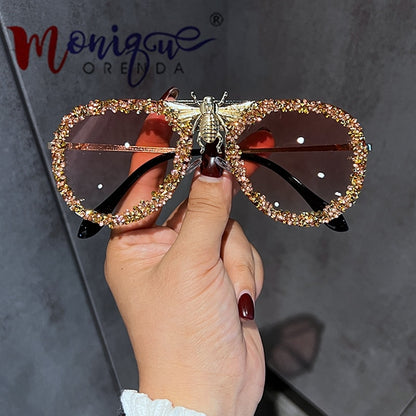 Lunettes de soleil de luxe pour femmes, monture métallique.