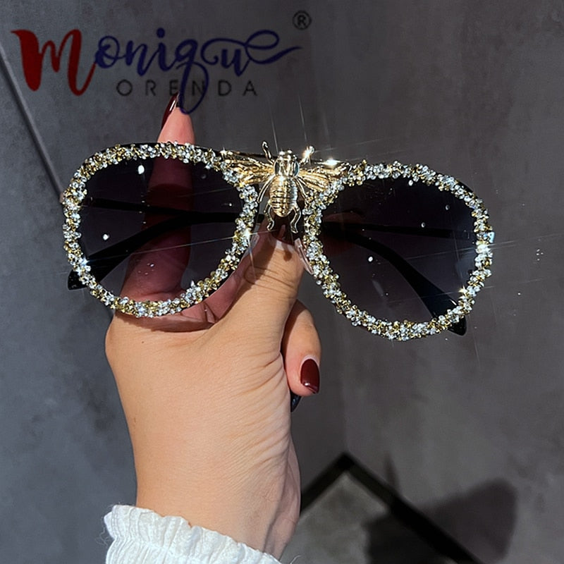 Lunettes de soleil de luxe pour femmes, monture métallique.