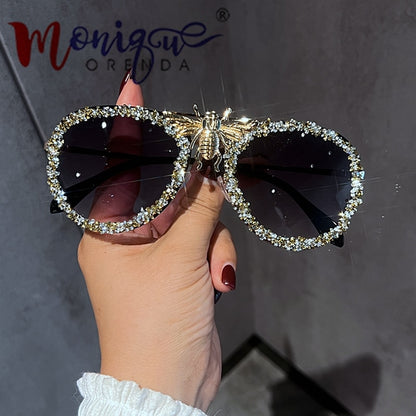 Lunettes de soleil de luxe pour femmes, monture métallique.