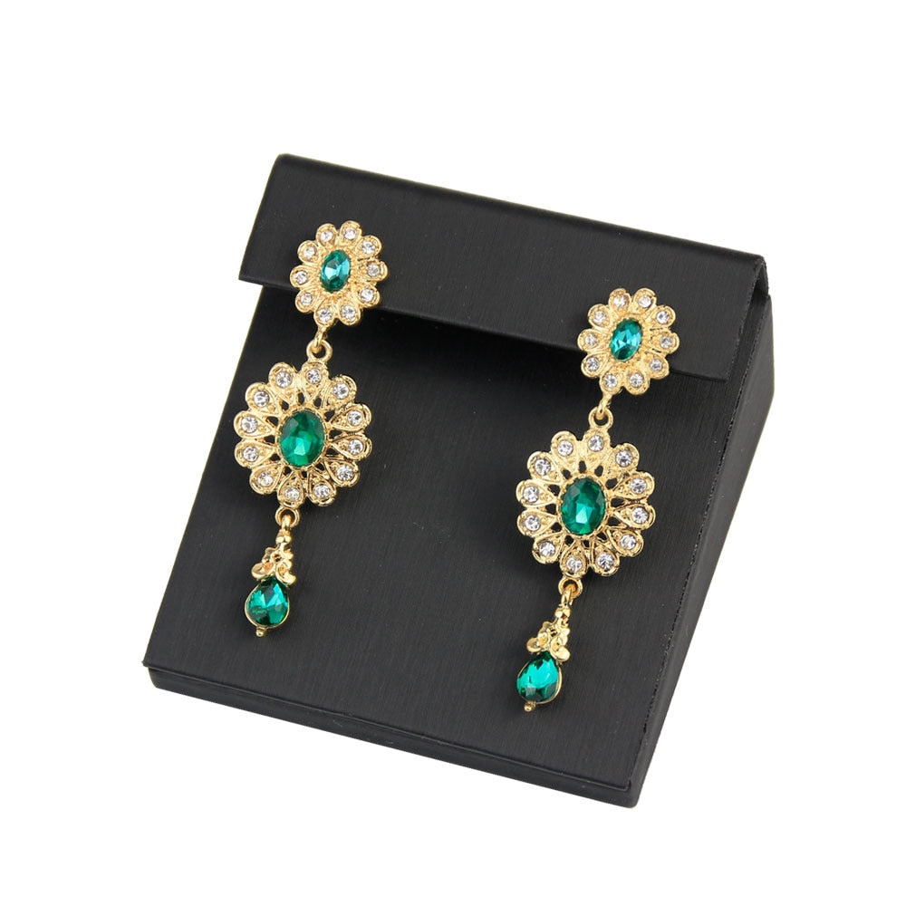 boucle d'oreille en forme de goutte d'eau pour femmes couleur or.