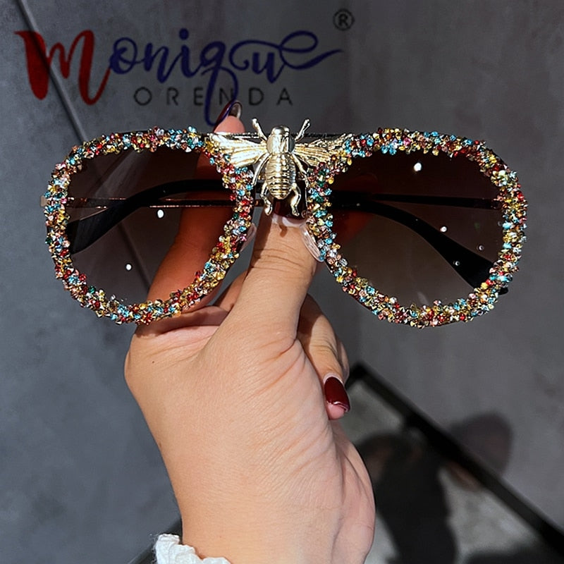 Lunettes de soleil de luxe pour femmes, monture métallique.