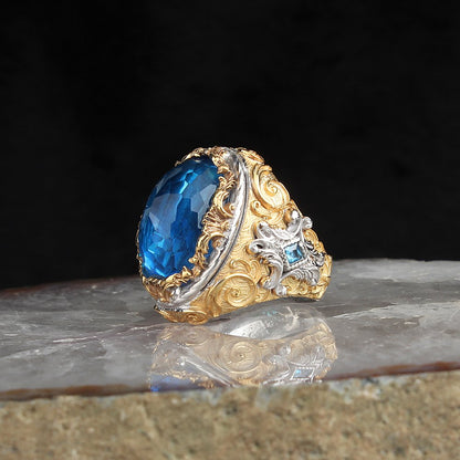 Bague hommes en argent pur 925 plaqué en or avec la pierre précieuse bleu .